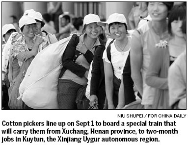 Cotton pickers travel to work the harvest in Xinjiang