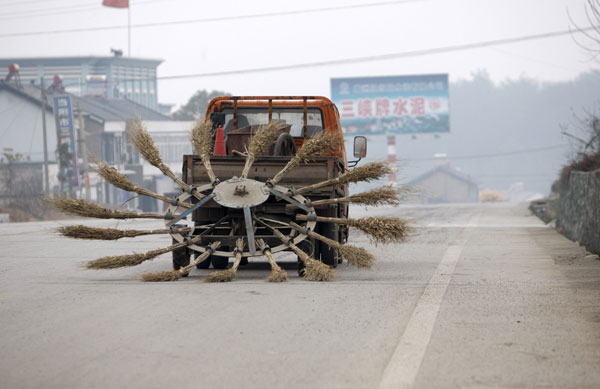 Road cleaner creates dust storm