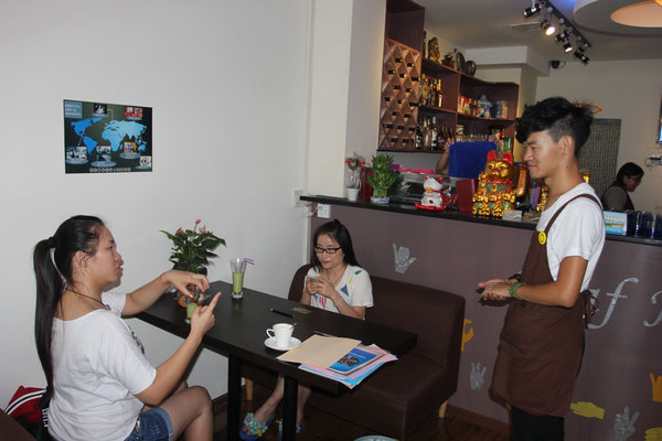 Sign language spoken at cafe in C China
