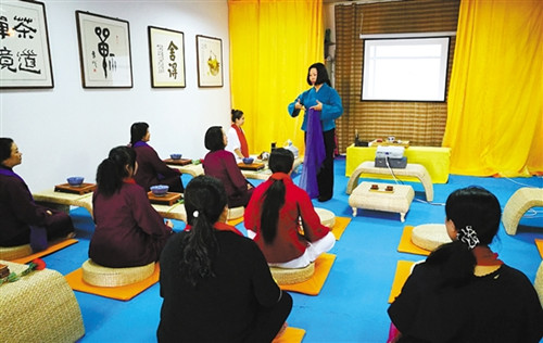 Yoga combines with traditional tea ceremony