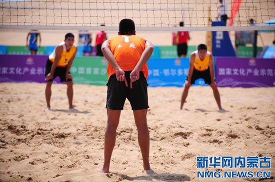 Beach volleyballers compete in Resonant Dunes Bay