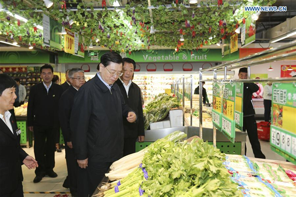 Top legislator stresses implementation of food safety law