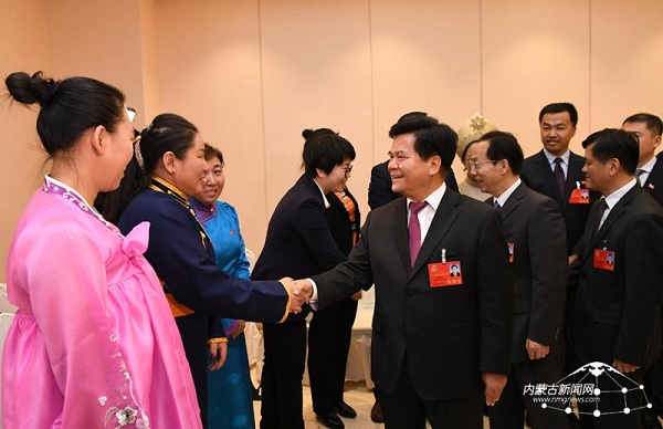 Li Jiheng and Bu Xiaolin meet with delegates of 10th Party congress