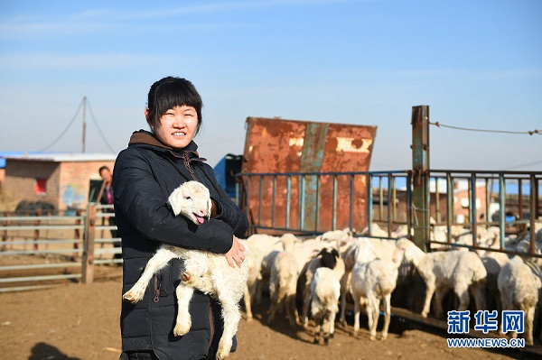 College graduate raises sheep on farm