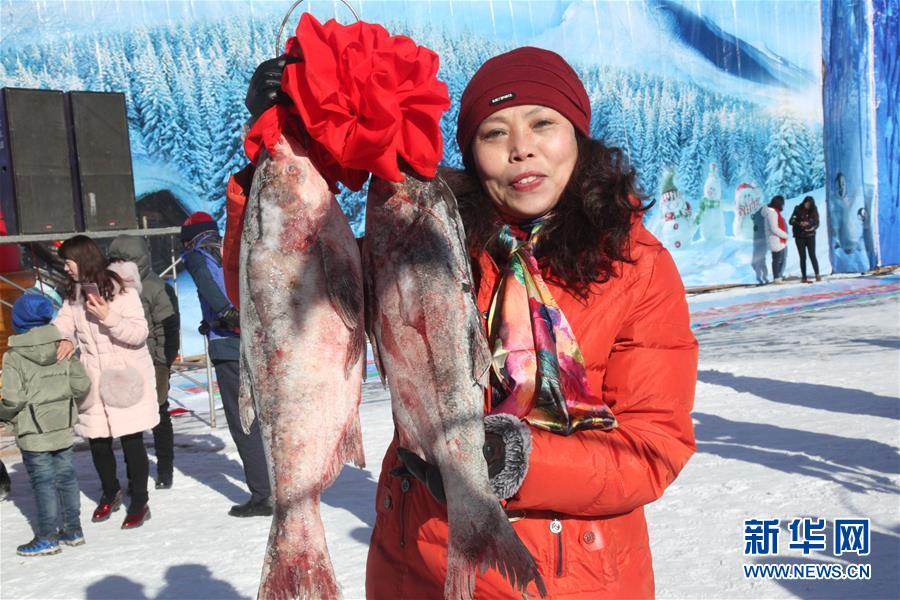 Winter fishing on frozen Zimeng Lake in Chifeng
