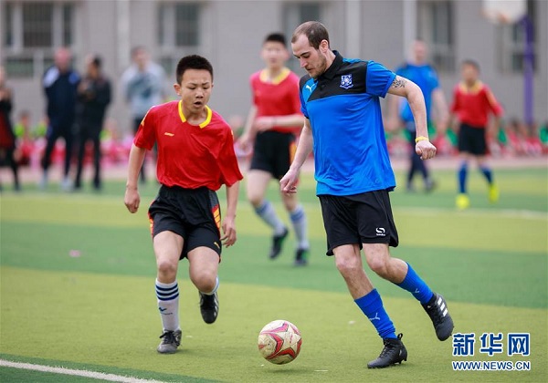 Foreign coaches teach soccer in Hohhot