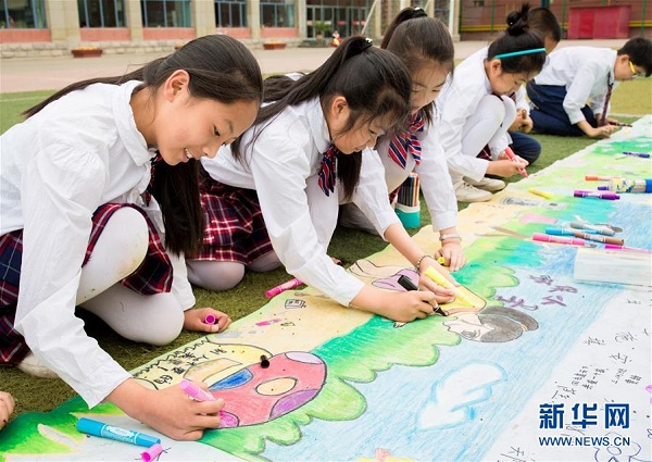 Hohhot pupils mark World Environment Day