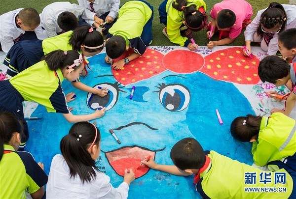 Hohhot pupils mark World Environment Day