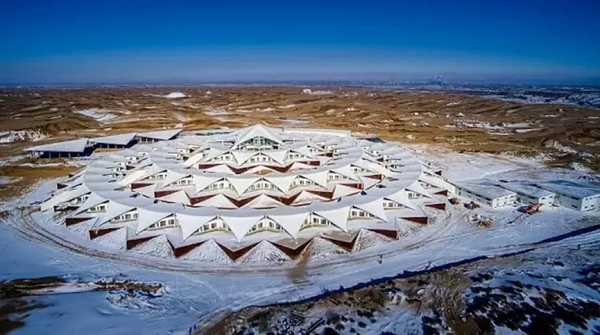 Ski slope paved across Kubuqi desert, creating land of ice and fire