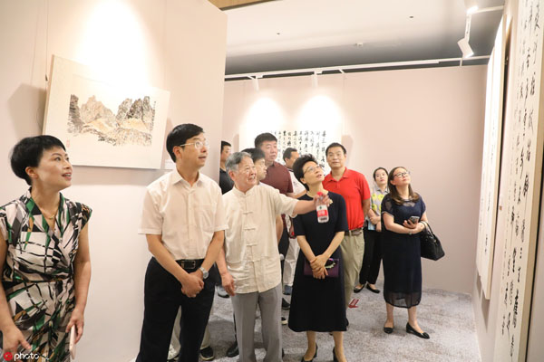 Yixing art master hosts first solo exhibition