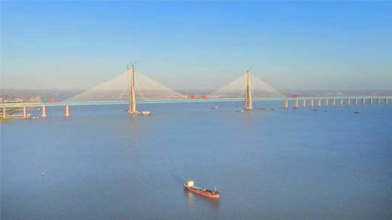 Main span of world's largest road-rail cable-stayed bridge connected