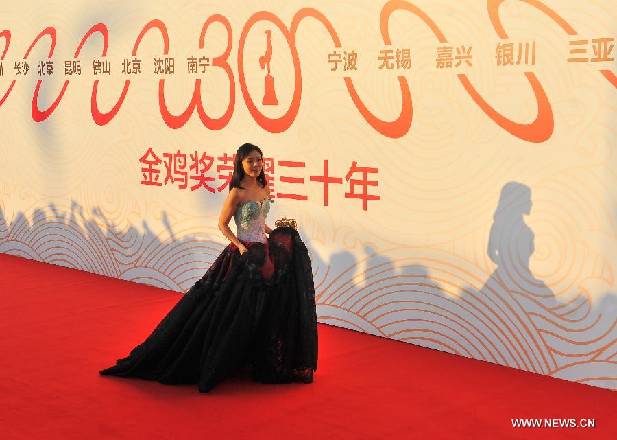 Stars shine at red carpet of 24th China Golden Rooster and Hundred Flowers Film Festival
