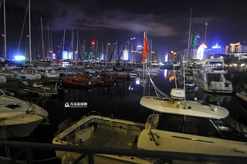 China's sailing city lights up at night