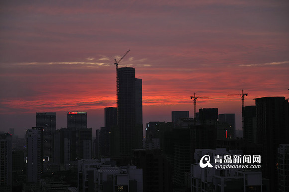 Burning clouds illuminate Qingdao sky