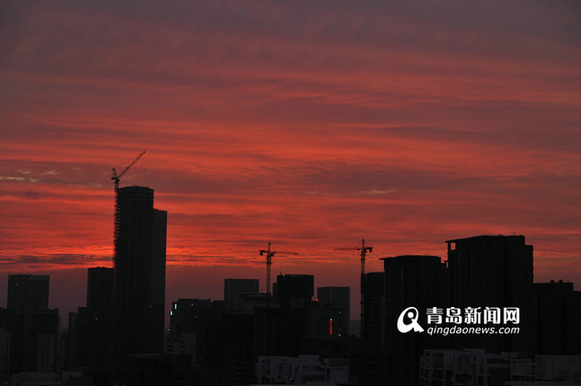 Burning clouds illuminate Qingdao sky