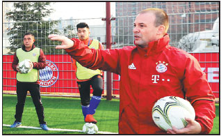 School soccer coaches trained by Bayern Munich
