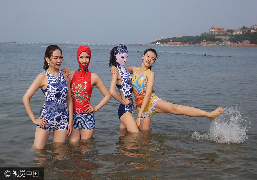 'Facekini' beauties attract plenty of attention at the beach