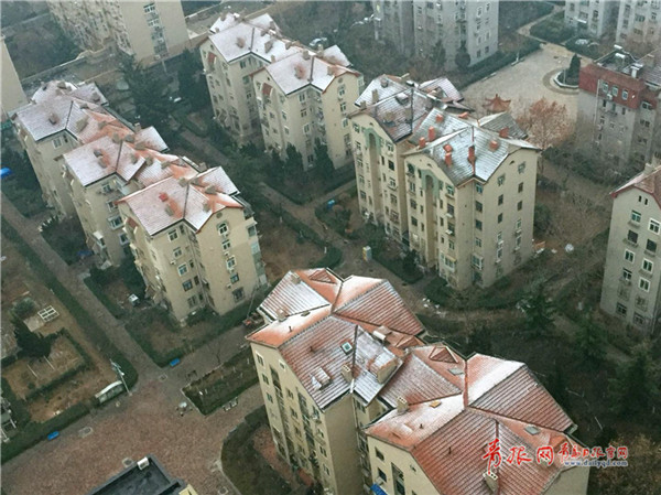 Qingdao welcomes first snow of the New Year