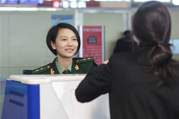 Serving with a smile: All-female police at Qingdao airport