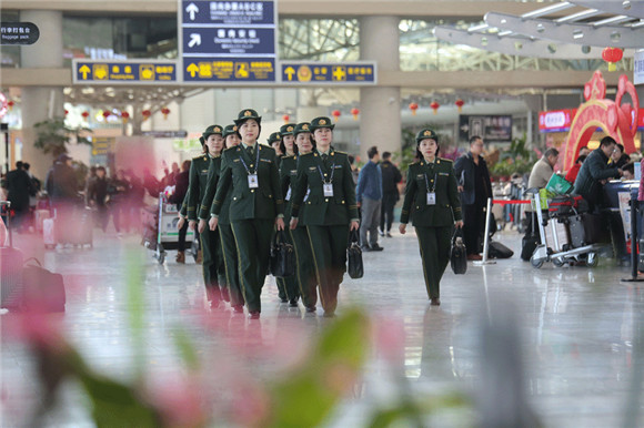 Serving with a smile: All-female police at Qingdao airport