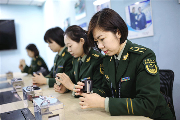 Serving with a smile: All-female police at Qingdao airport