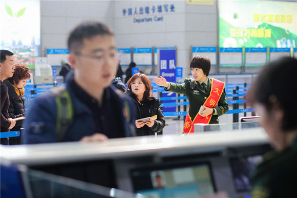 Serving with a smile: All-female police at Qingdao airport