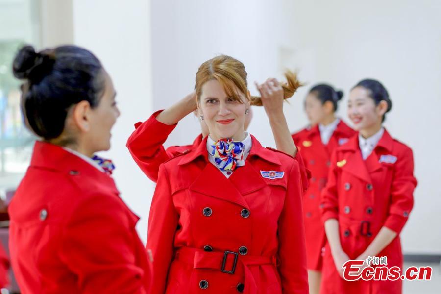 Foreign teachers apply to be flight attendants