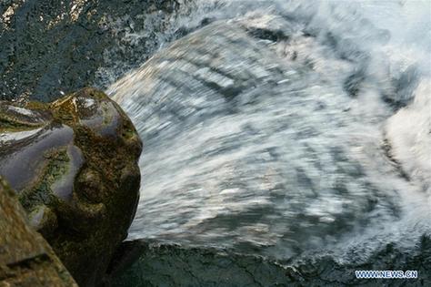 Torrential gush seen at Heihu Spring in E China's Jinan