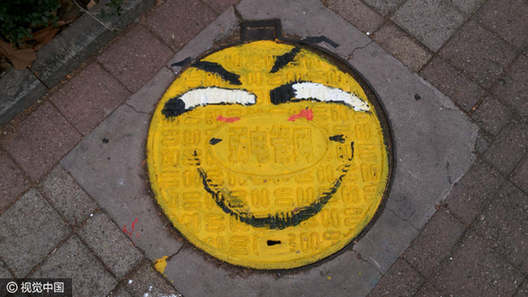 Students turn manhole covers into works of art