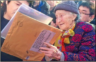 Woman gets gifts from hometown in Russia
