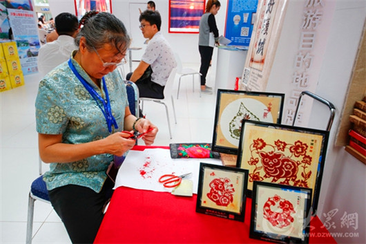 Cultural legacies dazzle at Shandong International Tourism Fair