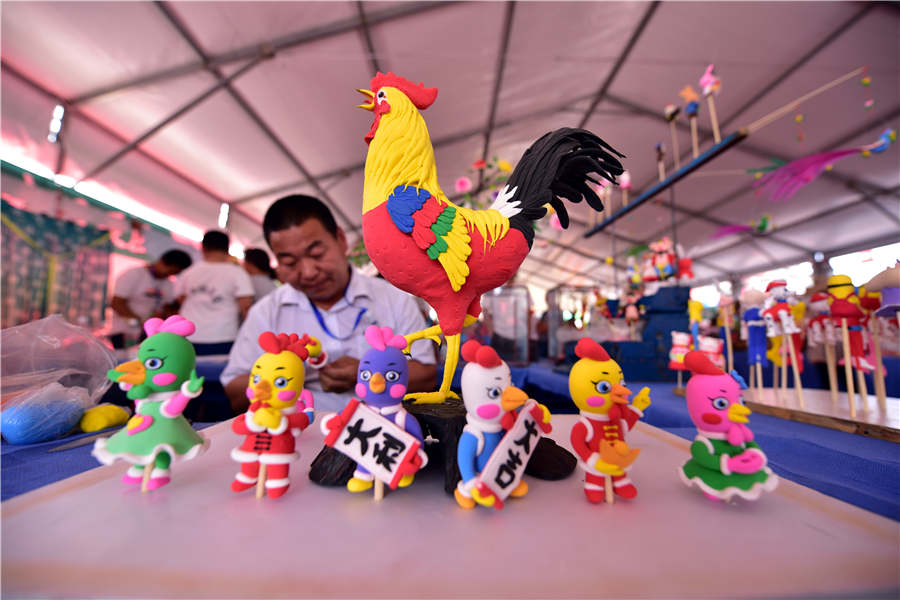 Dough figurines showcased at heritage expo in Shandong