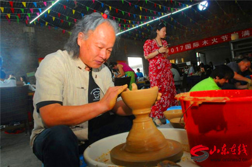 Intl Macsabal Woodfire Festival gets underway in Zibo