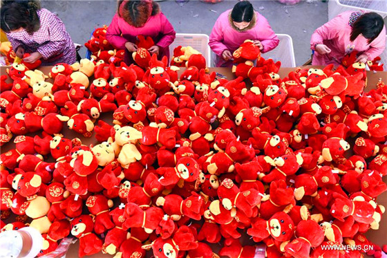 Dog dolls made to meet festival market demand