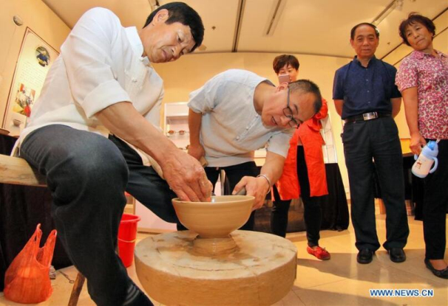 Intangible cultural heritage exhibition held in Yantai