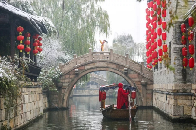 In pics: snow adorns Taierzhuang ancient town