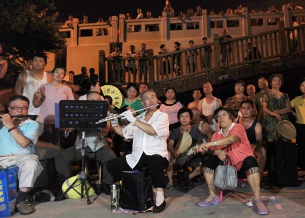 Photo exhibition relives highlights of Shandong cultural consumption season