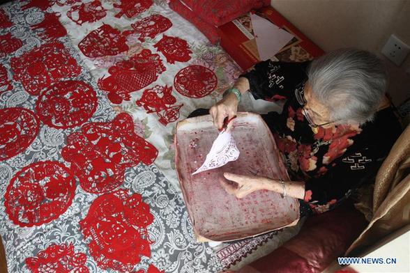 Paper-cuttings made by 103-year-old woman