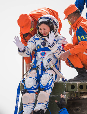 Crew members of the Shenzhou XIII mission return to Earth