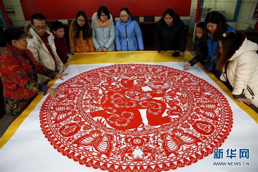 Paper-cut monkeys welcome Spring Festival