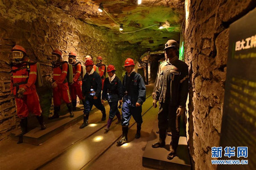 Tourists explore coal mine-themed park