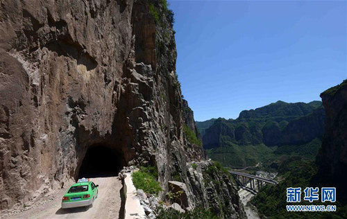 Cliff road winds through Taihang Mountains