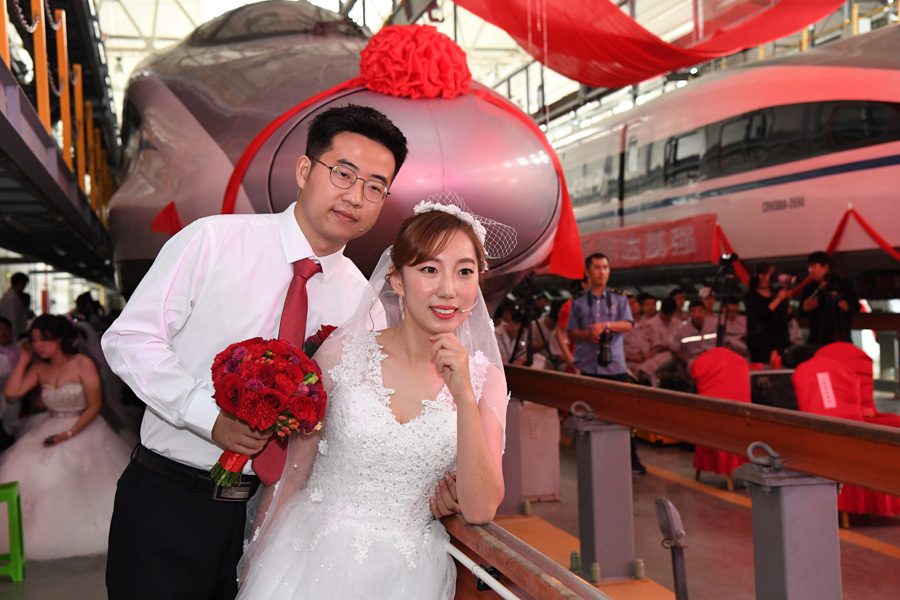 Couples start new journey at bullet train maintenance center