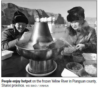 A meal of fire and ice - hotpot served on frozen river