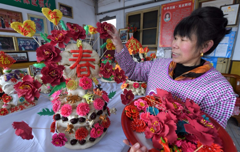 Steamed bun with colorful patterns made to celebrate Chinese Spring Festival