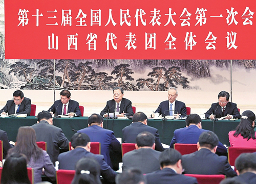 Shanxi NPC delegation discuss reports