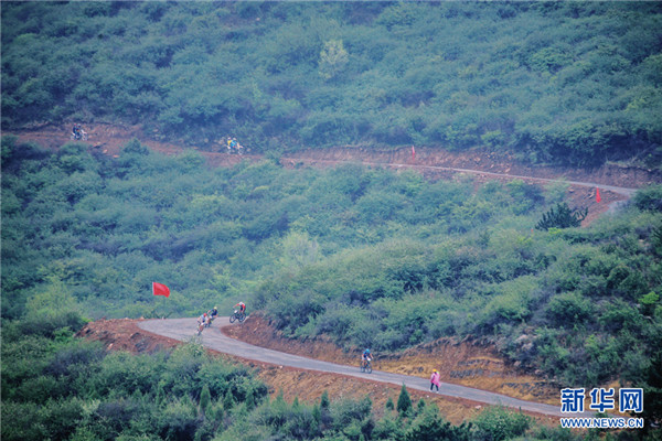 Yechuan promotes tourism through mountain cycling