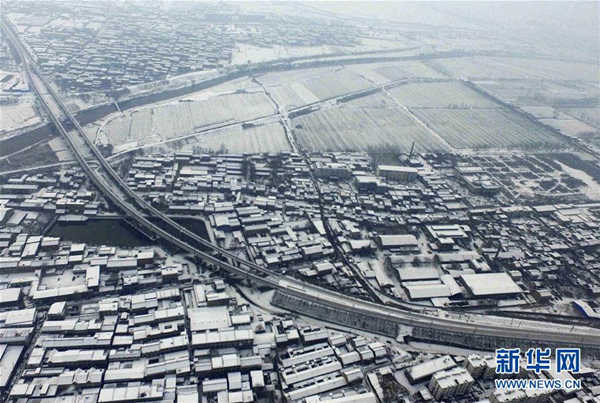 Snowfall blankets southern Shanxi