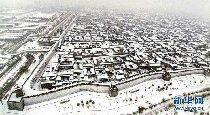 Unique winter scenery brings tourists to Pingyao