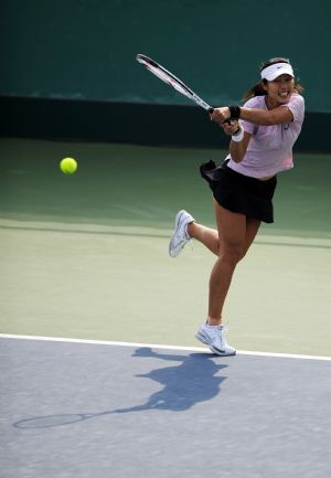 China's tennis stars advance at National Games